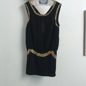 Black dress with gold accents